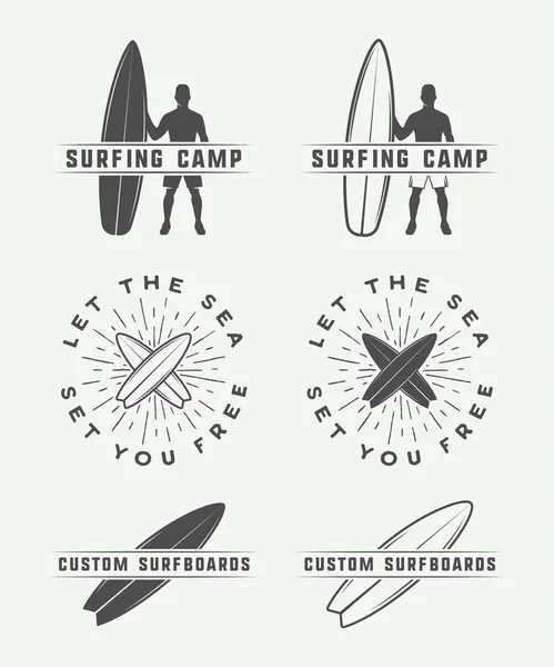 Set of vintage retro surfing, summer and travel logos, emblems — Stock Vector