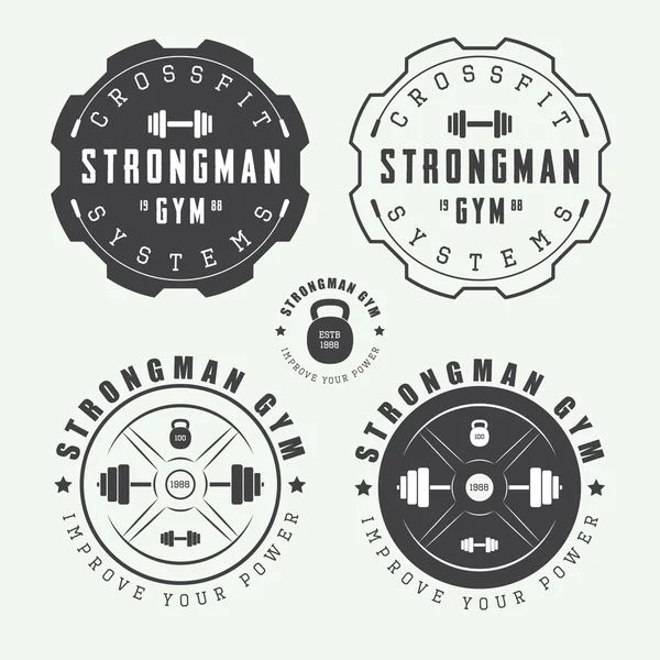 Set of gym logos, labels and slogans in vintage style — Stock Vector