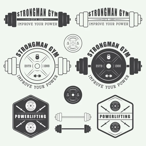 Uppsättning av gym logotyp, etiketter, märken och element i vintage stil — Stock vektor