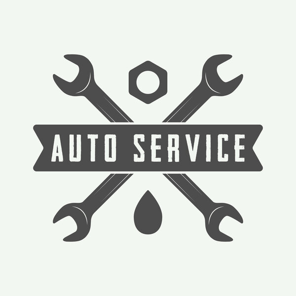 Vintage mechanic label, emblem and logo. Vector illustration