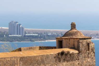 Scenic view of the historic sao filipe fort with the troia peninsula in the background, showcasing the blend of history and coastal beauty in setubal, portugal