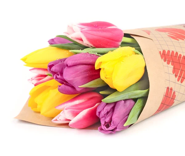 Kytice tulipánů jarní na bílém pozadí s prostorem pro text. — Stock fotografie