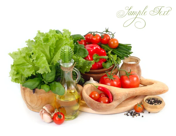 Fresh vegetables in wooden ware on a white background. — Stock Photo, Image