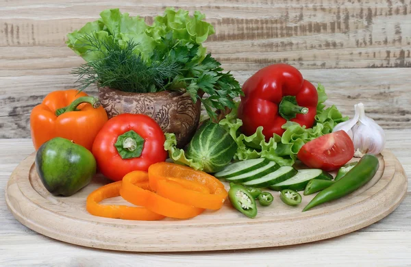 Fresh vegetables on a wooden background. — Stock Photo, Image