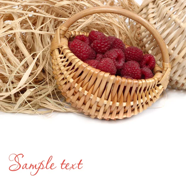 Fresh raspberry in a basket on a white background. — Stock Photo, Image