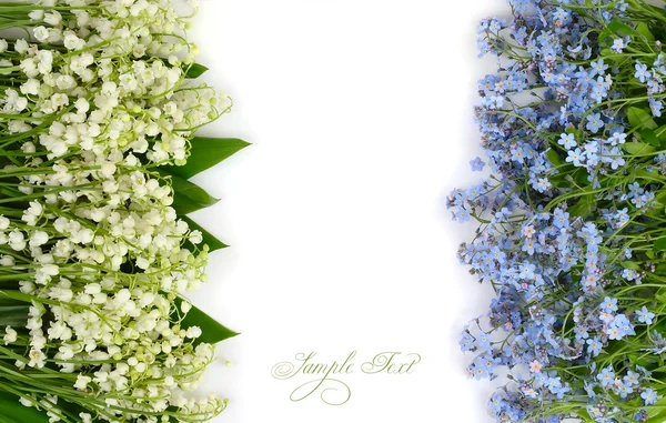 Flower background with lilies of the valley and blue flowers with a place for the text. Top view. — Stock Image Flower background with lilies of the valley and blue flowers with a place for the text. Top view. Stock Photo