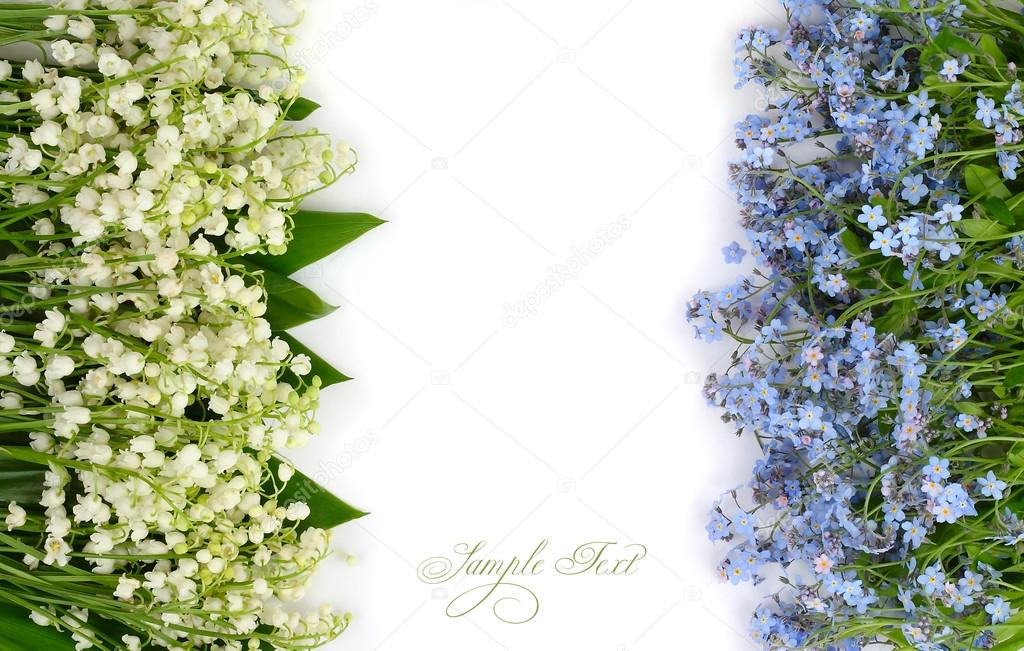 Flower background with lilies of the valley and blue flowers with a place for the text. Top view.