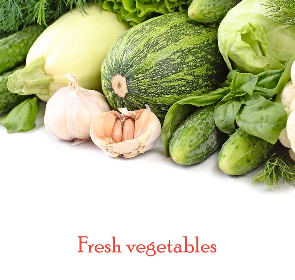 Fresh green vegetables on a white background with a place for the text. — Stock Photo, Image