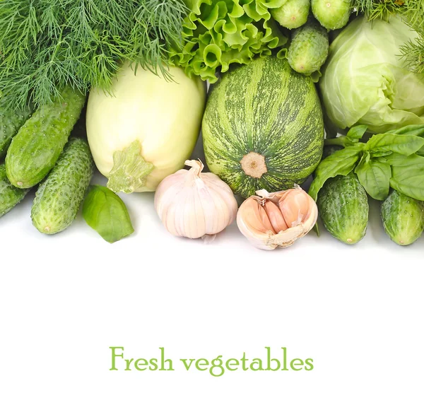 Fresh green vegetables on a white background with a place for the text. — Stock Photo, Image