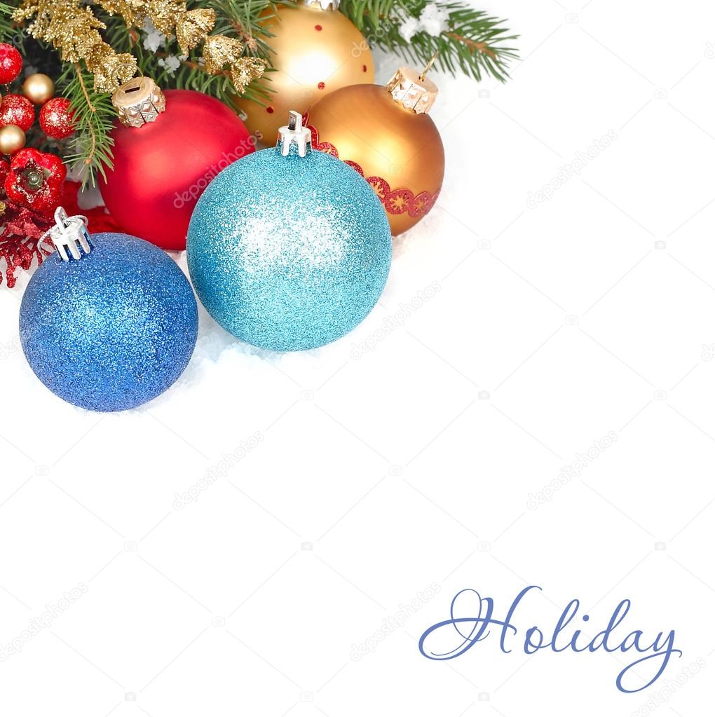 Multi-colored Christmas balls on a white background. A Christmas background with a place for the text.