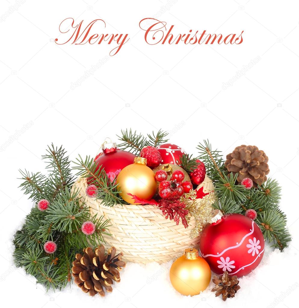 Christmas composition with Christmas balls in a wattled basket and other Christmas decor on a white background. A Christmas background with a place for the text.