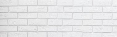 Beyaz tuğladan bir duvar. Uzayı metin için kopyala. Pankart