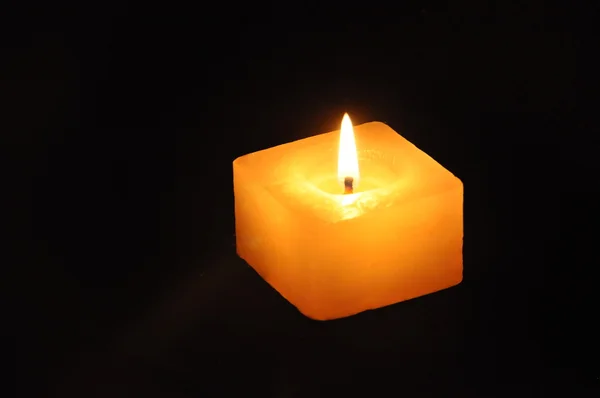 Burning Candle in the dark — Stock Photo, Image