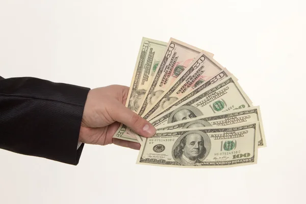 Beyaz arka plan üzerinde izole para teslim el