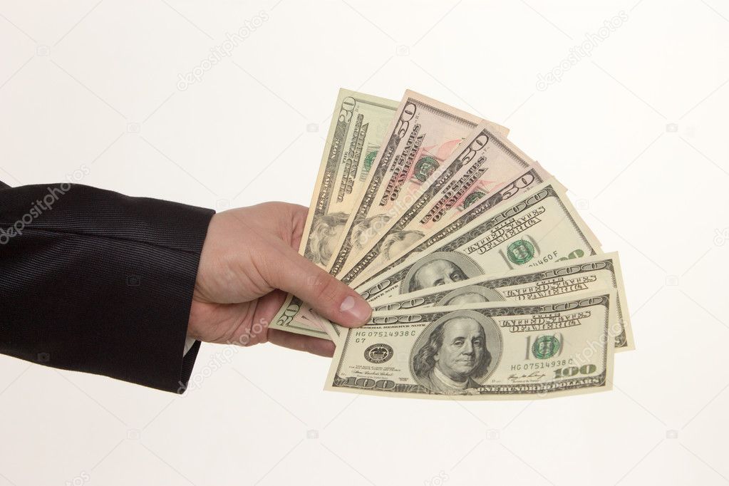 Hand handing over money isolated on white background
