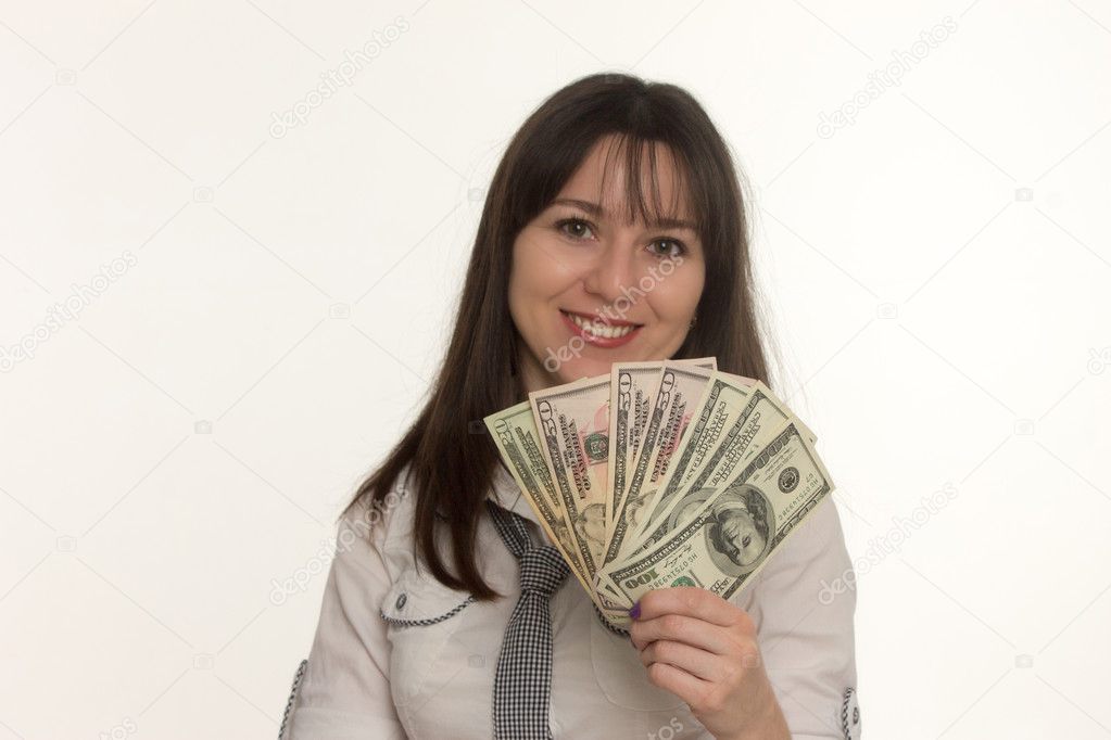happy girl with dollars in hand on white background