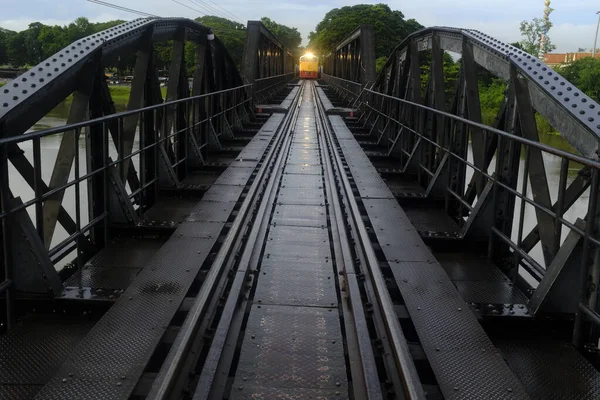 The train cross the famous railway-bridge over the Kwai river in Kanchanaburi, Thailand. Japan sought to create a transport route throught Siam into Burma, both occupied between 1942 and 1944 during the Second World War.