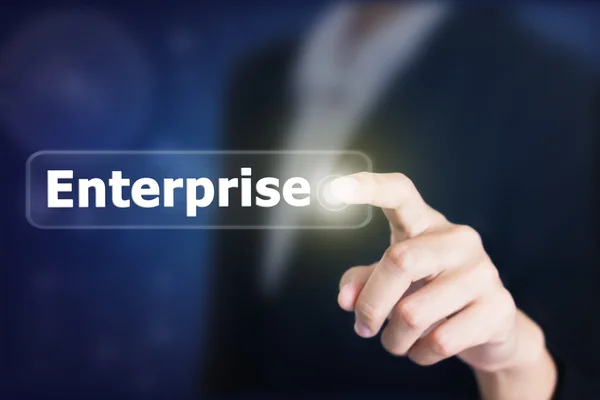 Empresario presionando un botón de concepto Enterprise. Puede ser utilizado en la publicidad . —  Fotos de Stock