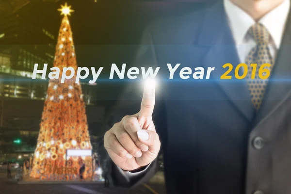 A Businessman holding a white sign with the message Happy New Year 2016. — Stock Photo, Image