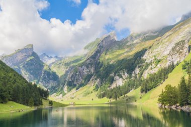 Seealpsee (lake) and the Alpstein massif clipart