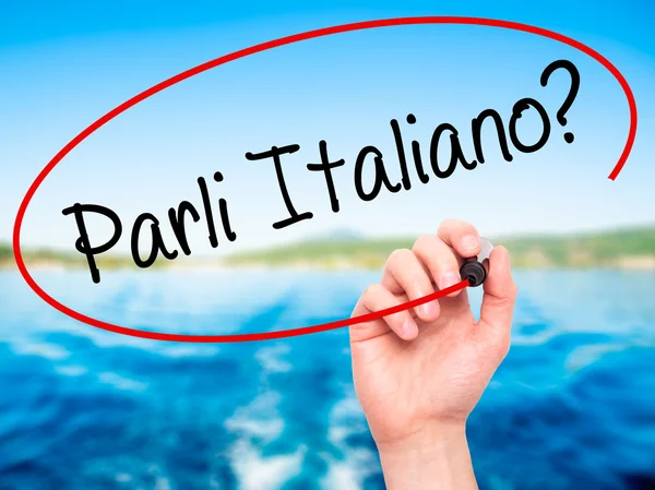 Man Hand writing Parli Italiano? with black marker on visual scr — Stock Photo, Image