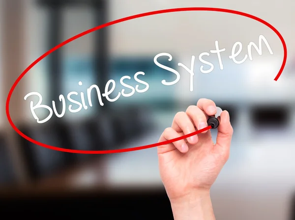 Man Hand writing Business System with black marker on visual scr — Stock Photo, Image