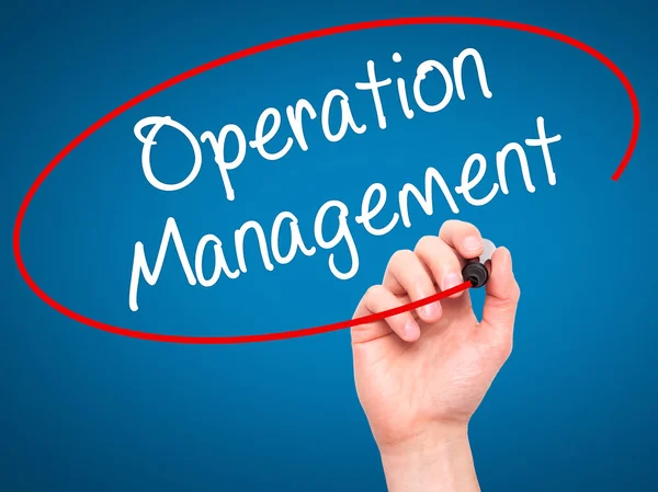 Man Hand writing Operation Management with black marker on visua — Stock Photo, Image