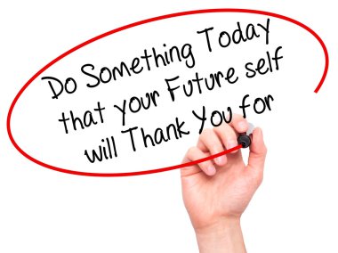 Man Hand writing Do Something Today that your Future self will T