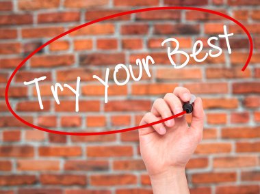 Adam el denemek senin en iyi görsel dağ eteğindeki taş yığını üzerinde siyah kalemi ile yazma