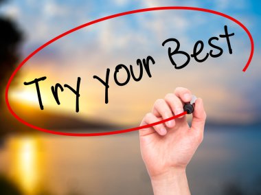 Adam el denemek senin en iyi görsel dağ eteğindeki taş yığını üzerinde siyah kalemi ile yazma