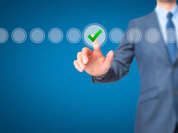 Businessman check mark on virtual screen. Finger on a checklist — Stock Photo, Image