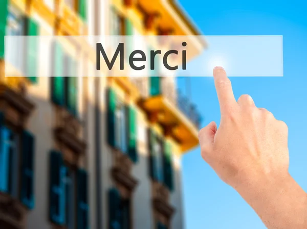 Merci - Mano premendo un pulsante sul concetto di sfondo sfocato su — Foto Stock