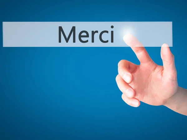 Merci - Hand drückt eine Taste auf verschwommenes Hintergrundkonzept — Stockfoto