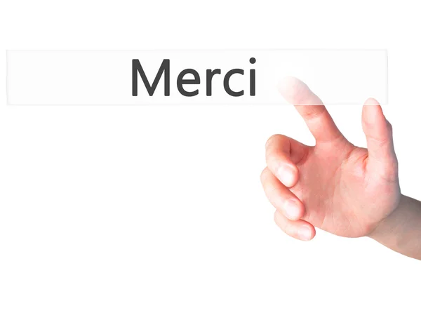 Merci - Hand trycka på en knapp på suddig bakgrund koncept — Stockfoto