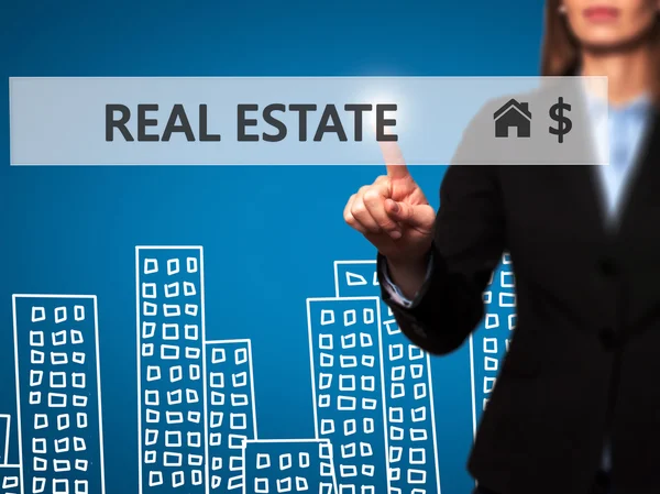 Real estate agent pressing button on virtual screen. — Stock Photo, Image