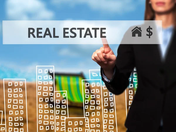 Real estate agent pressing button on virtual screen. — Stock Photo, Image