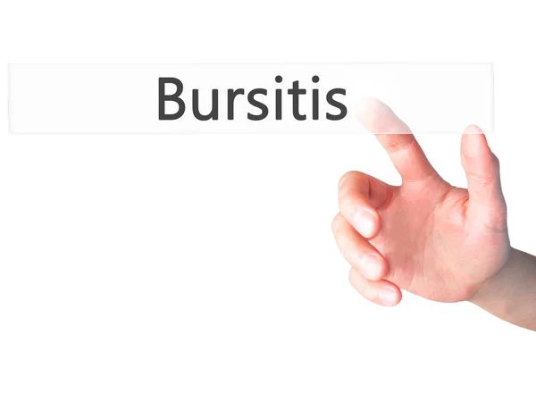 Bursitis - Mano presionando un botón sobre el concepto de fondo borroso — Foto de Stock