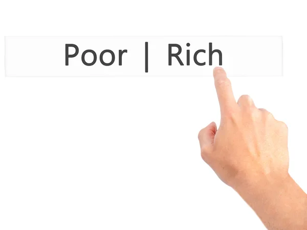 穷人富人-手压按钮上背景模糊的概念 — 图库照片