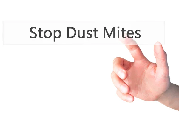 Stop Dust Mites - Hand pressing a button on blurred background c — Stock Photo, Image