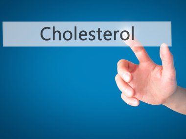 Kolesterol - arka plan bulanık conce üzerinde bir düğmeye basarak el