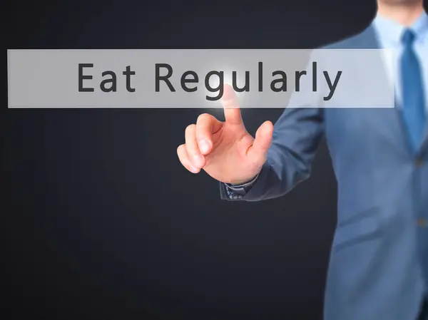 Eat Regularly - Businessman hand pressing button on touch screen — Stock Photo, Image