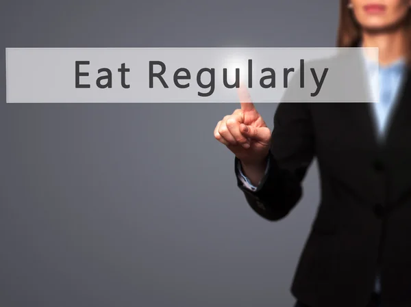 Eat Regularly - Businesswoman hand pressing button on touch scre — Stock Photo, Image