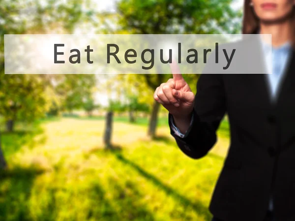 Eat Regularly - Businesswoman hand pressing button on touch scre — Stock Photo, Image