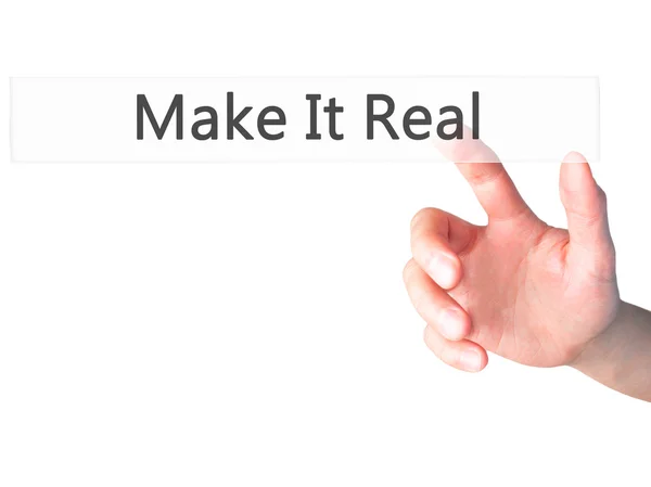 Make It Real - Hand pressing a button on blurred background concept — Stock Photo, Image