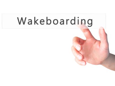 Wakeboarding - arka plan bulanık konsantrasyon üzerinde bir düğmeye basarak el