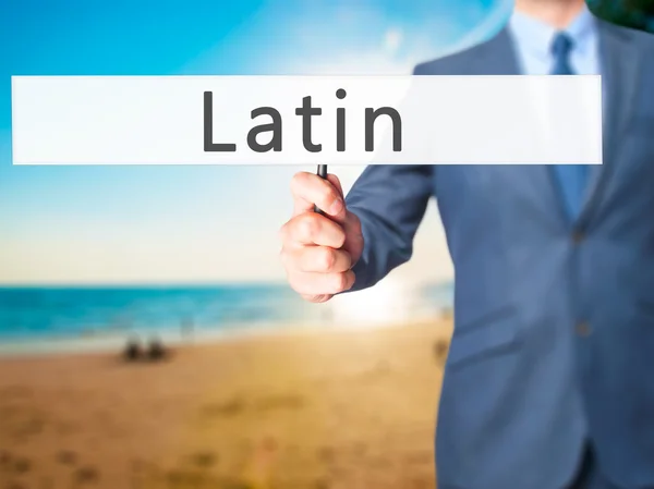 Latín - Empresario mano sosteniendo cartel — Foto de Stock