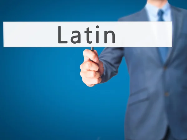 Latín - Empresario mano sosteniendo cartel — Foto de Stock