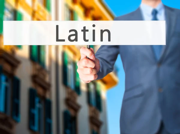 Latín - Empresario mano sosteniendo cartel — Foto de Stock