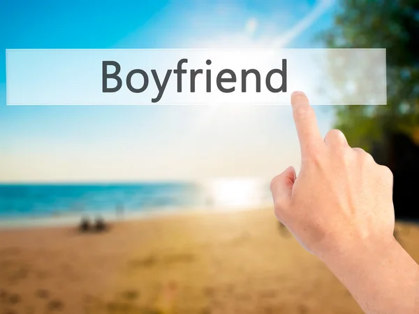 Boyfriend - Hand pressing a button on blurred background concept — Stock Photo, Image