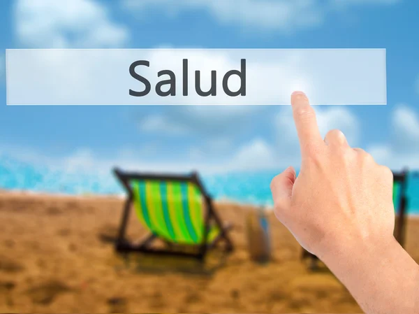 Salud - Handdrücken auf einen Knopf am verschwommenen Hintergrundkonzept — Stockfoto